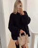 Oversized sweater with puffed sleeves - comfort and elegance